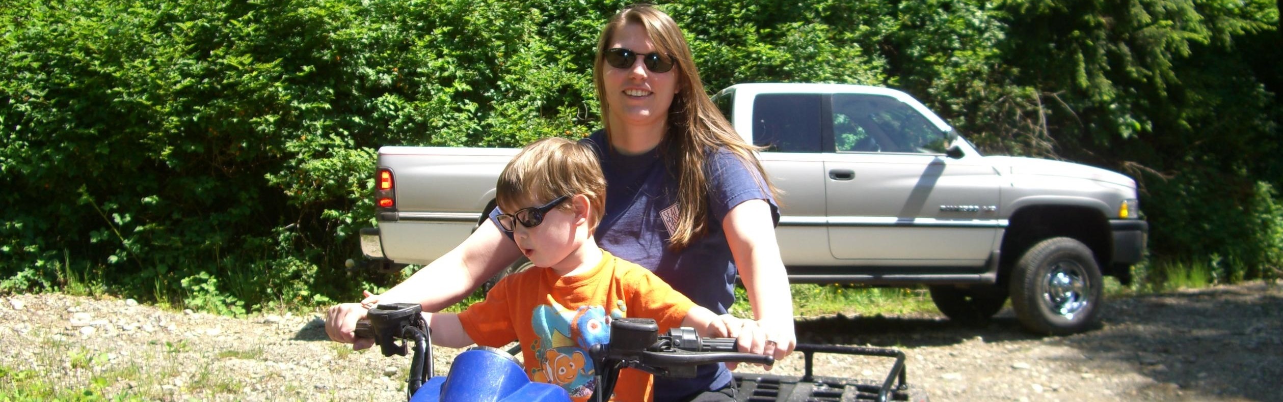 Kim on a quad with son